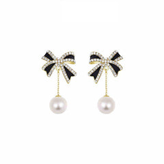 Bow Pearl earrings - the perfect combination of fashion and elegance