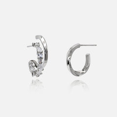 Brillantes comme une étoile, ces boucles d'oreilles en zirconium scintillantes illuminent chacun de vos moments forts